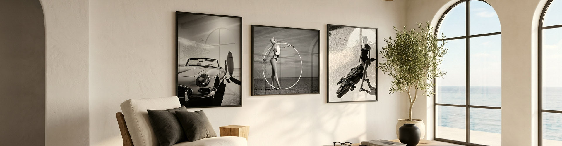 A gallery wall features six art prints, including black-and-white pieces—portraits of women, a leopard in a grand hall, a swimmer underwater, and vintage-style photography.