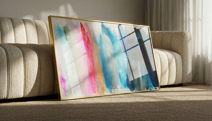 A gallery wall features six art prints, including colorful and black-and-white pieces—portraits of women, a leopard in a grand hall, a swimmer underwater, and vintage-style photography.