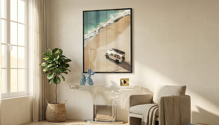 A gallery wall features six art prints, including colorful and black-and-white pieces—portraits of women, a leopard in a grand hall, a swimmer underwater, and vintage-style photography.